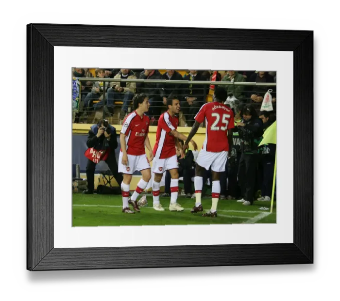 Framed Print : Arsenal's Unforgettable Goal Celebration: Adebayor, Fabregas, and Nasri in the UEFA Champions League Quarterfinal vs. Villarreal (2009)