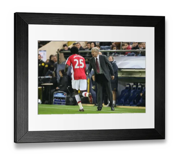 Framed Print : Adebayor and Wenger: Unforgettable Goal Celebration in Arsenal's UEFA Champions League Battle with Villarreal, 2009 Framed Print : Adebayor and Wenger: Unforgettable Goal Celebration in Arsenal's UEFA Champions League Battle with Villarreal, 2009