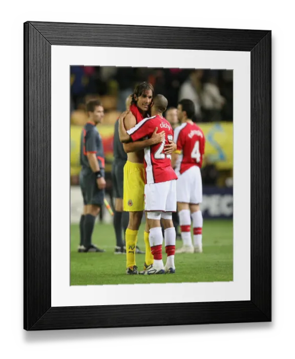 Framed Print : Clichy and Pires Face Off: A Battle of Past Glories in the 2009 Champions League Quarterfinal between Villarreal and Arsenal Framed Print : Clichy and Pires Face Off: A Battle of Past Glories in the 2009 Champions League Quarterfinal between Villarreal and Arsenal