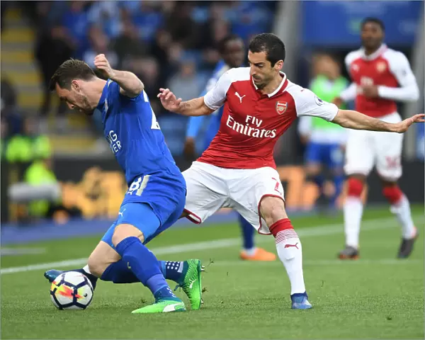 Mkhitaryan vs Fuchs: Intense Battle in Leicester City vs Arsenal Premier League Clash