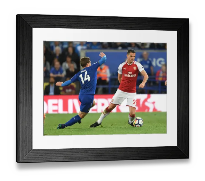 Framed Print : Xhaka vs Silva: Intense Battle in Leicester City vs Arsenal Premier League Clash