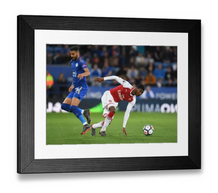 Framed Print : Ainsley Maitland-Niles Outmaneuvers Riyad Mahrez in Leicester vs Arsenal Premier League Clash Framed Print : Ainsley Maitland-Niles Outmaneuvers Riyad Mahrez in Leicester vs Arsenal Premier League Clash