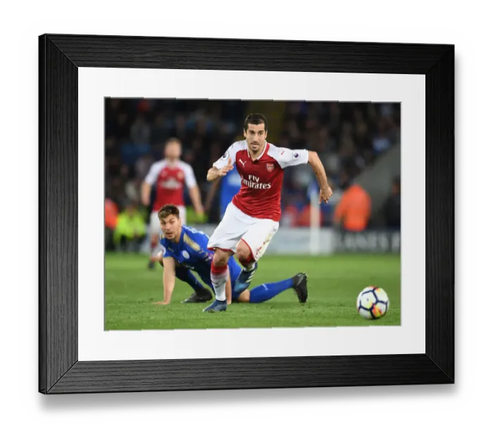 Framed Print : Mkhitaryan Outsmarts Dragovic: Premier League Battle - Arsenal's Star Outmaneuvers Leicester's Defender Framed Print : Mkhitaryan Outsmarts Dragovic: Premier League Battle - Arsenal's Star Outmaneuvers Leicester's Defender