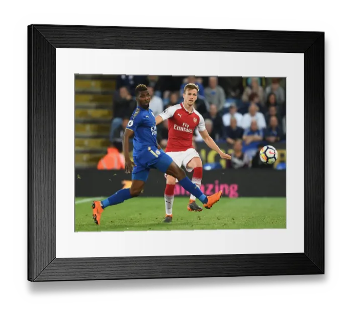 Framed Print : Clash of Titans: Holding vs Iheanacho - A Battle for Premier League Dominance