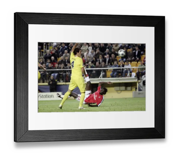 Framed Print : Emmanuel Adebayor scores Arsenals goal under presure
