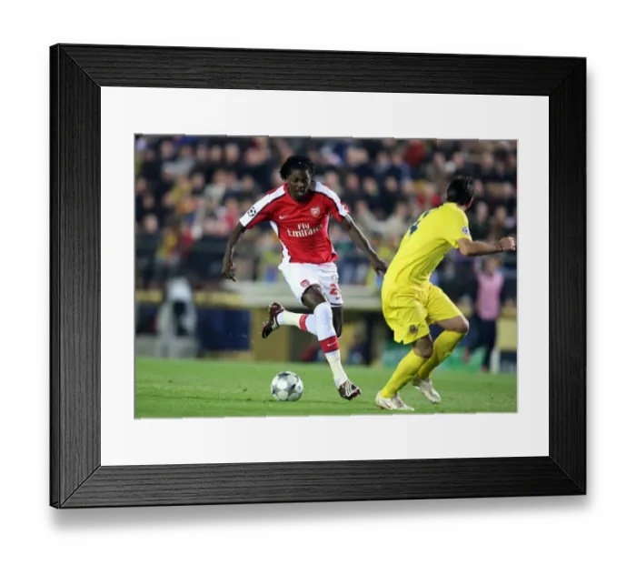 Framed Print : Emmanuel Adebayor (Arsenal) Diego Godin (Villarreal)
