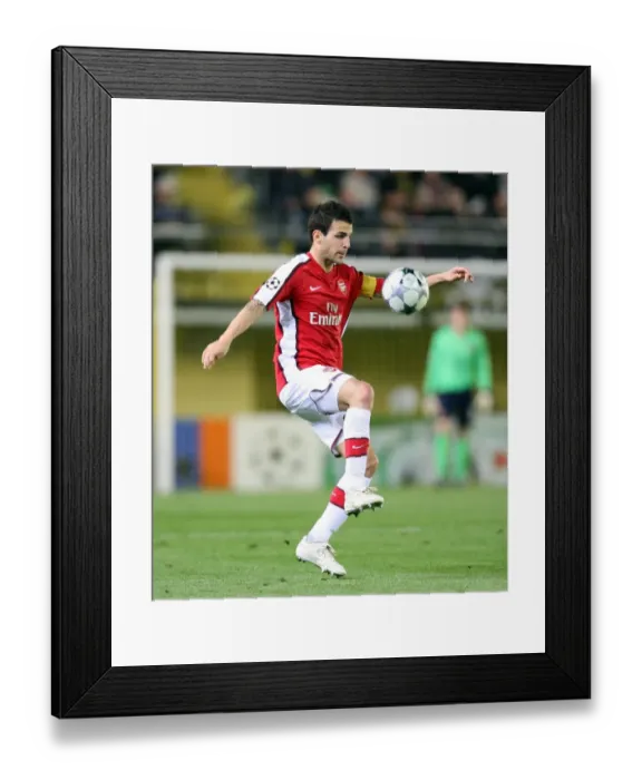 Framed Print : Cesc Fabregas's Intense Performance: Arsenal vs. Villarreal - A Battle in the UEFA Champions League Quarterfinals