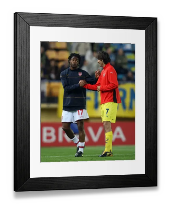 Framed Print : Alex Song and Robert Pires: A Reunion Before the Battle - Arsenal vs. Villarreal, UEFA Champions League Quarterfinal, 1st Leg, 2009 Framed Print : Alex Song and Robert Pires: A Reunion Before the Battle - Arsenal vs. Villarreal, UEFA Champions League Quarterfinal, 1st Leg, 2009