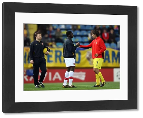 Kolo Toure (Arsenal) Robert Pires (Villarreal) before the match