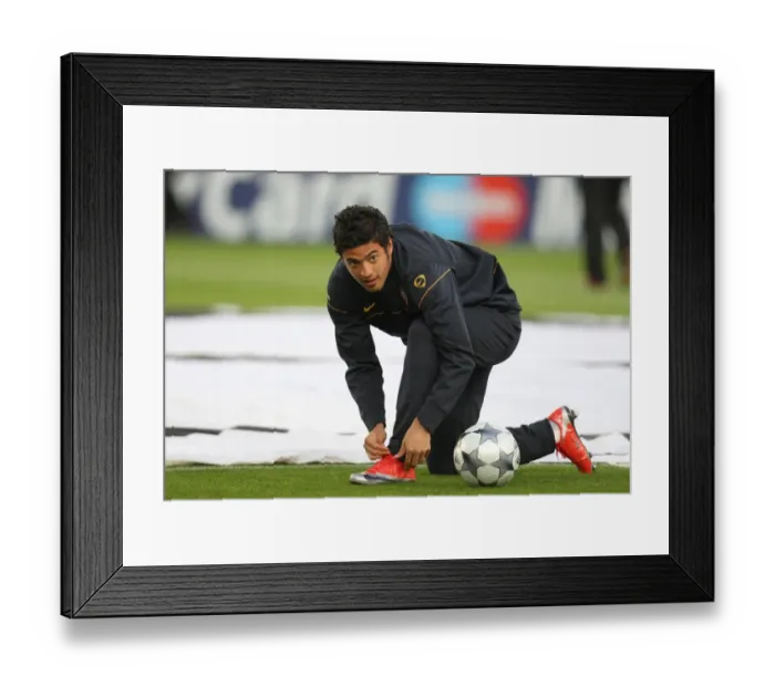 Framed Print : Carlos Vela vs Villarreal: A Battle in the Arsenal's UEFA Champions League Quarterfinal, 1st Leg