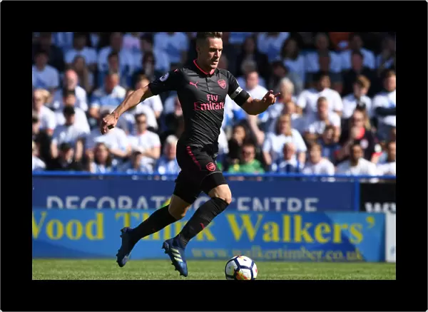 Arsenal's Aaron Ramsey in Action against Huddersfield Town (2017-18 Premier League)