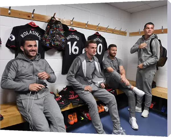 Arsenal Backline: Sead Kolasinac, Rob Holding, Shkodran Mustafi, and Granit Xhaka - Huddersfield Match Preparation (2017-18)