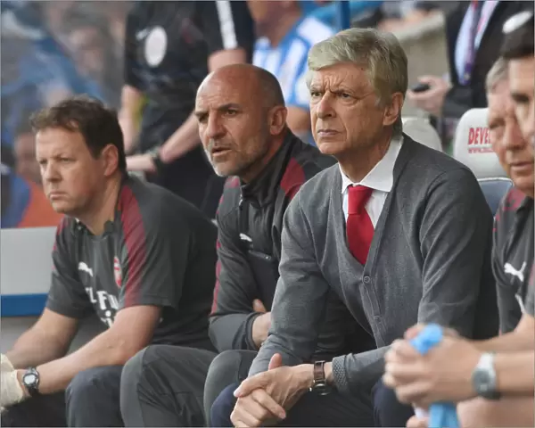 Arsene Wenger and Steve Bould: Focused on the Field during Arsenal's Match against Huddersfield Town, 2018