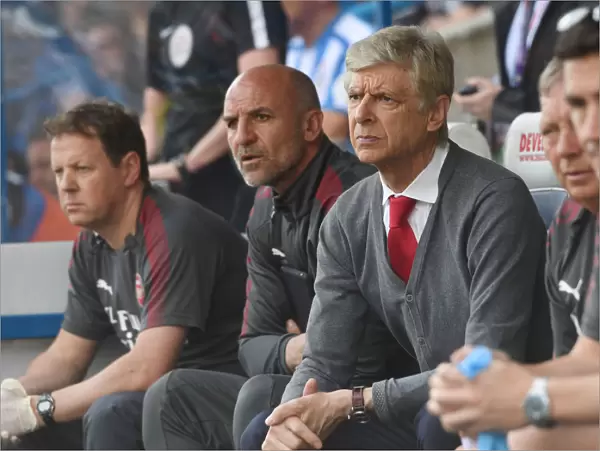 Arsene Wenger and Steve Bould: Focused on the Field during Arsenal's Match against Huddersfield Town, 2018