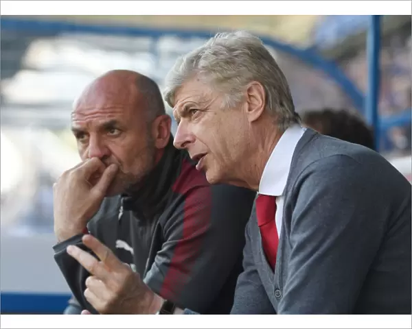 Arsene Wenger and Steve Bould: A Farewell Look as Arsenal Secure Premier League Victory over Huddersfield Town