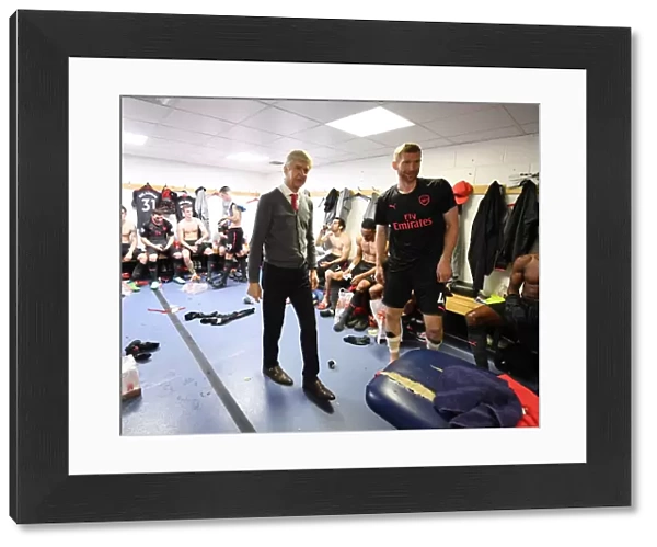 Arsene Wenger and Per Mertesacker in the Arsenal Changing Room After Huddersfield Match, 2018