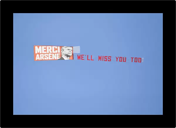 Plane Flies Over Huddersfield Stadium with Arsene Wenger Banner during Arsenal Match