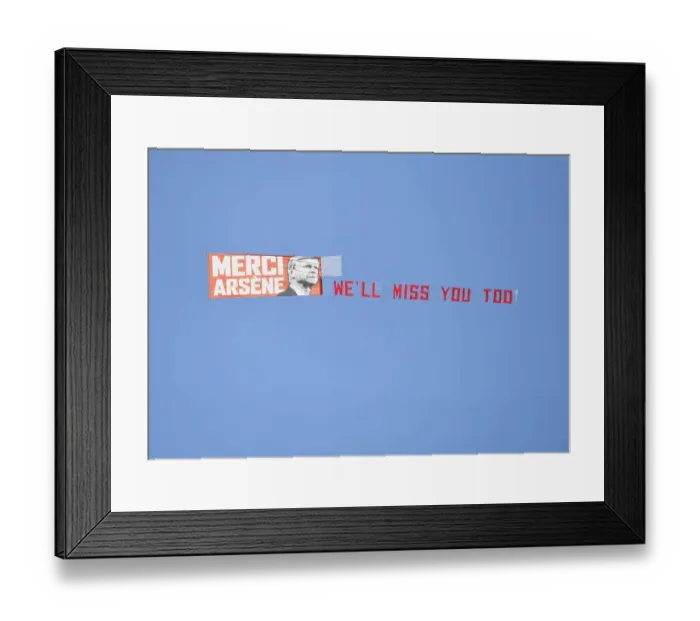 Framed Print : Plane Flies Over Huddersfield Stadium with Arsene Wenger Banner during Arsenal Match Framed Print : Plane Flies Over Huddersfield Stadium with Arsene Wenger Banner during Arsenal Match