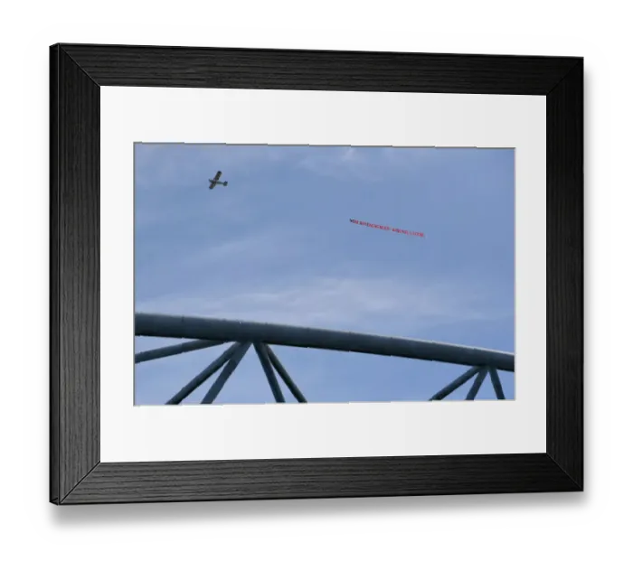 Framed Print : Plane Tows Arsene Wenger Tribute Banner Over Huddersfield Stadium Framed Print : Plane Tows Arsene Wenger Tribute Banner Over Huddersfield Stadium