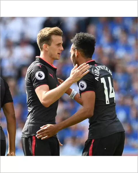 Aubameyang and Holding Celebrate Arsenal's Goal Against Huddersfield Town