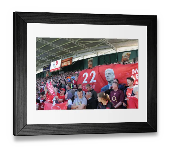 Framed Print : Arsenal Fans Honor Arsene Wenger with Banners at Huddersfield Match