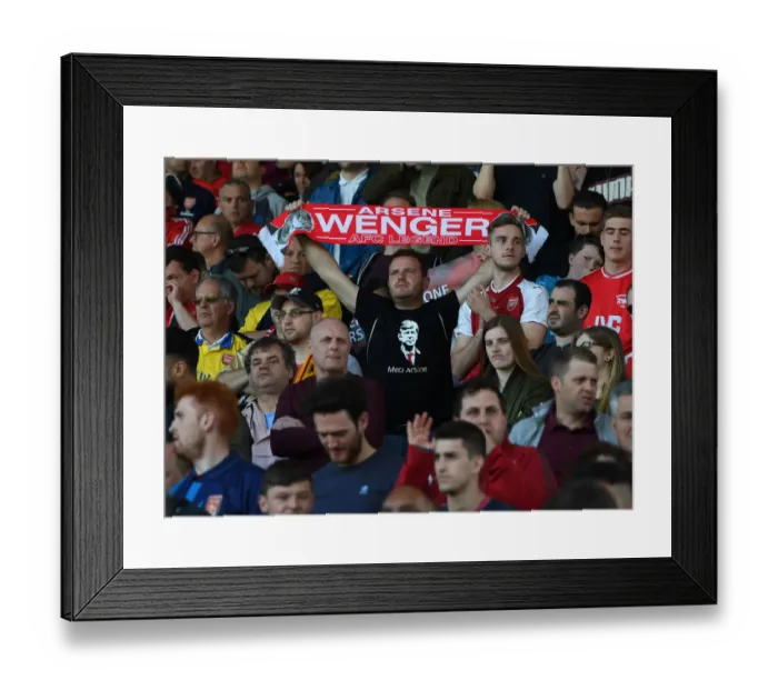 Framed Print : Arsenal Fans Honor Arsene Wenger with Banners at Huddersfield Match