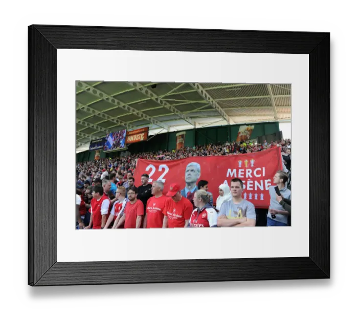 Framed Print : Arsenal Fans Honor Arsene Wenger with Banners at Huddersfield Match
