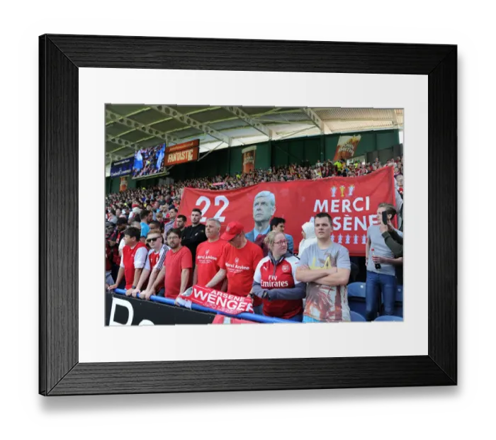 Framed Print : Arsenal Fans Honor Arsene Wenger with Banners at Huddersfield Match