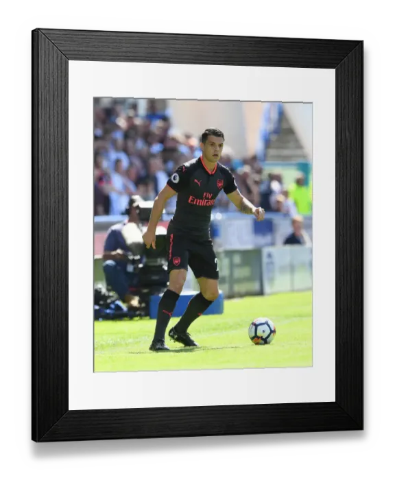 Framed Print : Granit Xhaka: Arsenal Midfielder in Action vs. Huddersfield Town, Premier League 2017-18