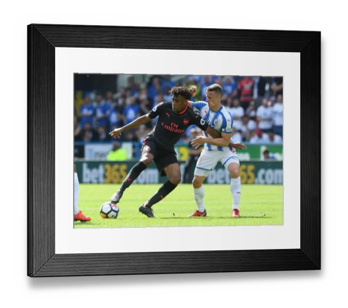 Framed Print : Intense Battle: Alex Iwobi vs. Jonathan Hogg in Premier League Showdown Framed Print : Intense Battle: Alex Iwobi vs. Jonathan Hogg in Premier League Showdown