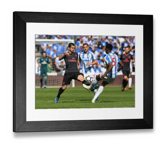 Framed Print : Mkhitaryan vs. Kongolo: Intense Battle for Ball Possession - Huddersfield Town vs. Arsenal (2017-18)