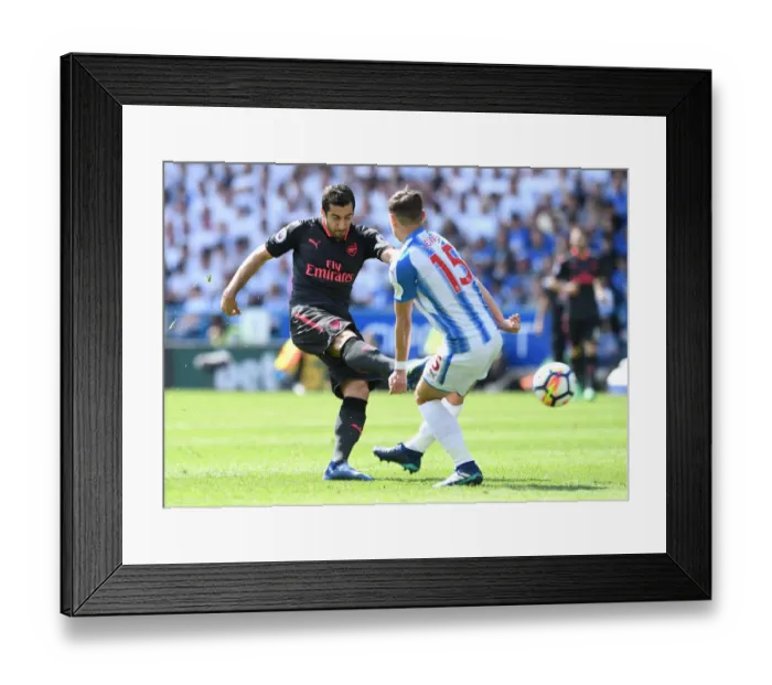 Framed Print : Mkhitaryan Faces Off Against Lowe: Huddersfield vs Arsenal, Premier League Showdown