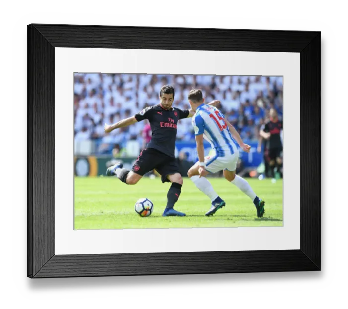 Framed Print : Mkhitaryan vs Lowe: A Fierce Battle in Arsenal's Premier League Clash