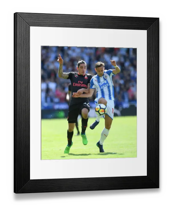 Framed Print : Hector Bellerin vs. Chris Lowe: A Premier League Battle at Huddersfield