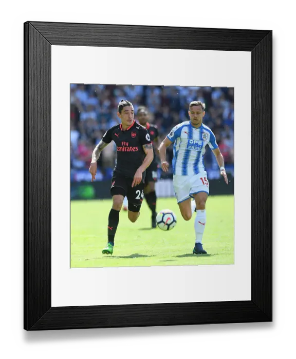 Framed Print : Hector Bellerin vs. Chris Lowe: Intense Battle in Huddersfield Town vs. Arsenal Premier League Clash
