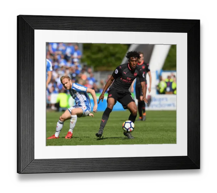 Framed Print : Clash of Midfielders: Iwobi vs. Pritchard - Huddersfield Town vs. Arsenal, Premier League