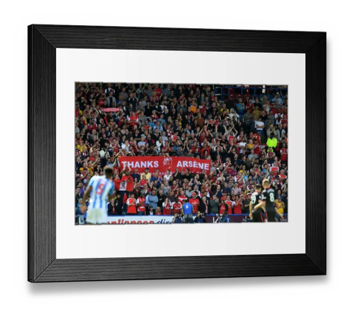 Framed Print : Arsenal Fans Honor Arsene Wenger with Banners at Huddersfield Match