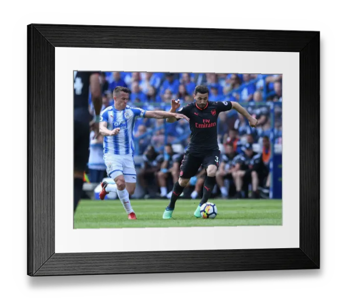 Framed Print : Fierce Rivalry: Sead Kolasinac vs. Jonathan Hogg in the Huddersfield Town vs. Arsenal Clash Framed Print : Fierce Rivalry: Sead Kolasinac vs. Jonathan Hogg in the Huddersfield Town vs. Arsenal Clash