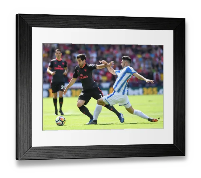 Framed Print : Mkhitaryan vs Schindler: Intense Battle in Huddersfield Town vs Arsenal Premier League Clash