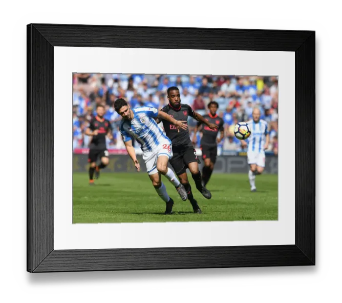Framed Print : Clash of Titans: Lacazette vs. Schindler in Huddersfield Derby