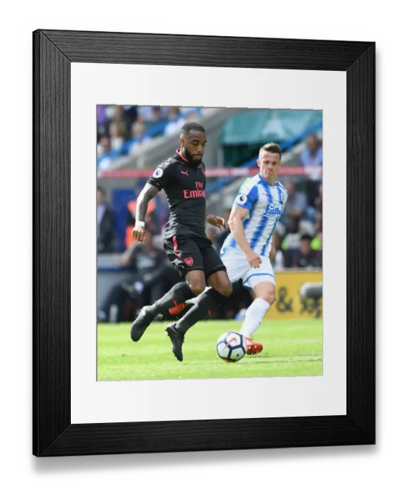 Framed Print : Lacazette vs. Hogg: Intense Battle in Huddersfield Town vs. Arsenal Premier League Clash