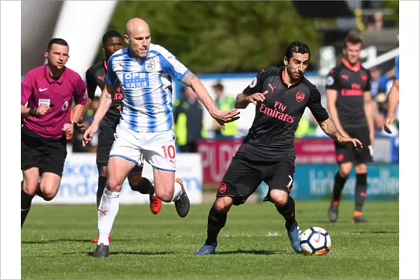 Mkhitaryan vs Mooy: Intense Battle in Huddersfield Town vs Arsenal Premier League Clash