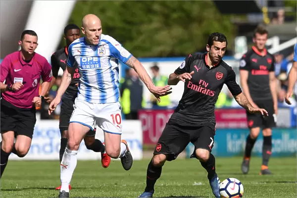 Mkhitaryan vs Mooy: Intense Battle in Huddersfield Town vs Arsenal Premier League Clash