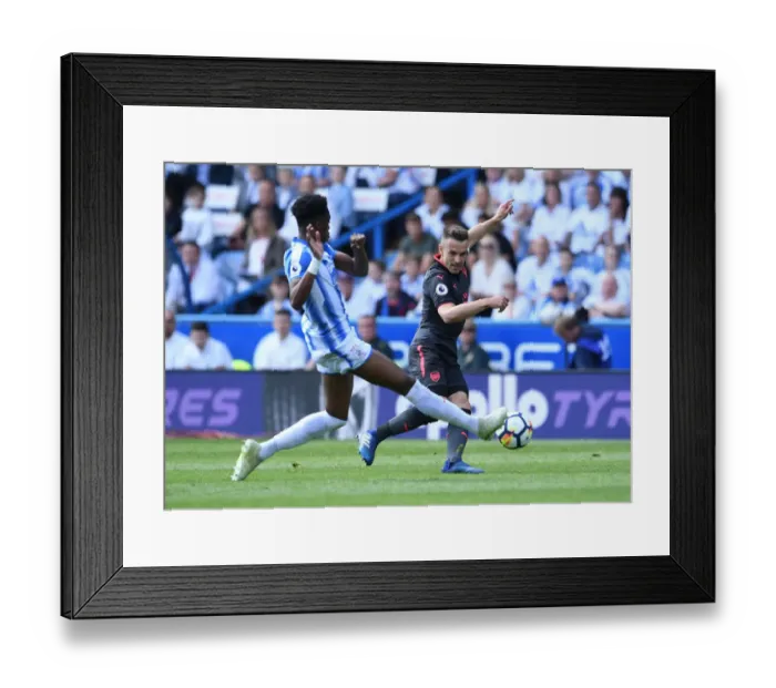 Framed Print : Clash at John Smiths: Ramsey vs. Kongolo, Huddersfield vs. Arsenal, Premier League 2017-18 Framed Print : Clash at John Smiths: Ramsey vs. Kongolo, Huddersfield vs. Arsenal, Premier League 2017-18