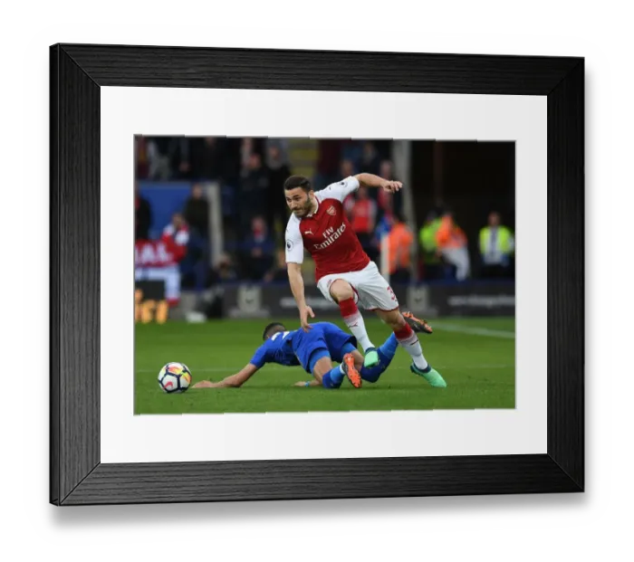 Framed Print : Clash of Wings: Mahrez vs. Kolasinac in Leicester City vs. Arsenal Premier League Showdown