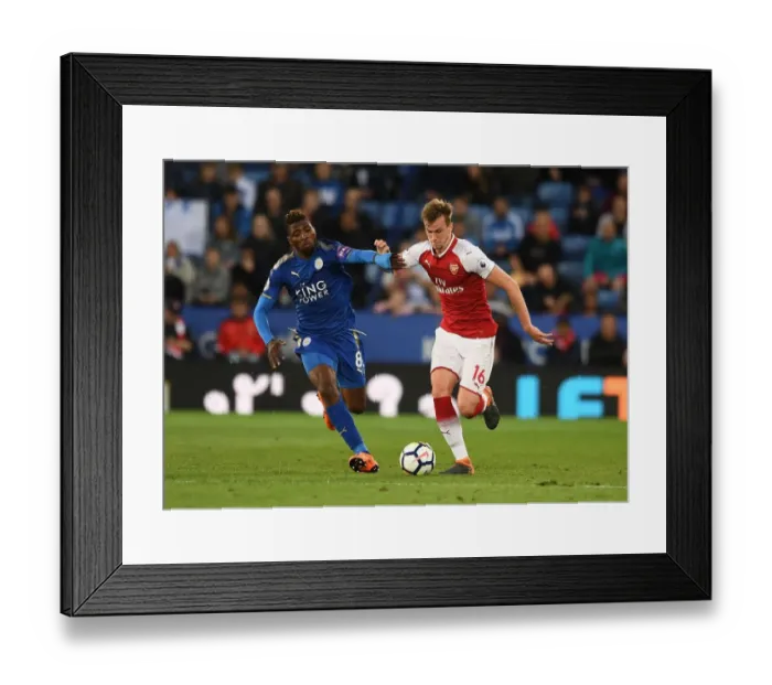 Framed Print : Clash of Titans: Holding vs Iheanacho - A Battle for Premier League Supremacy (Arsenal vs Leicester City 2017-18)