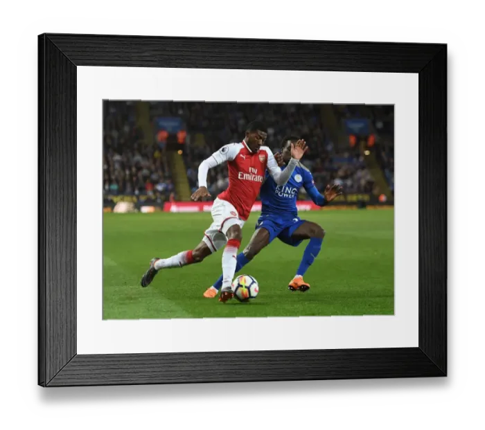 Framed Print : Arsenal's Ainsley Maitland-Niles Clashes with Leicester's Fousseni Diabate in Premier League Showdown Framed Print : Arsenal's Ainsley Maitland-Niles Clashes with Leicester's Fousseni Diabate in Premier League Showdown