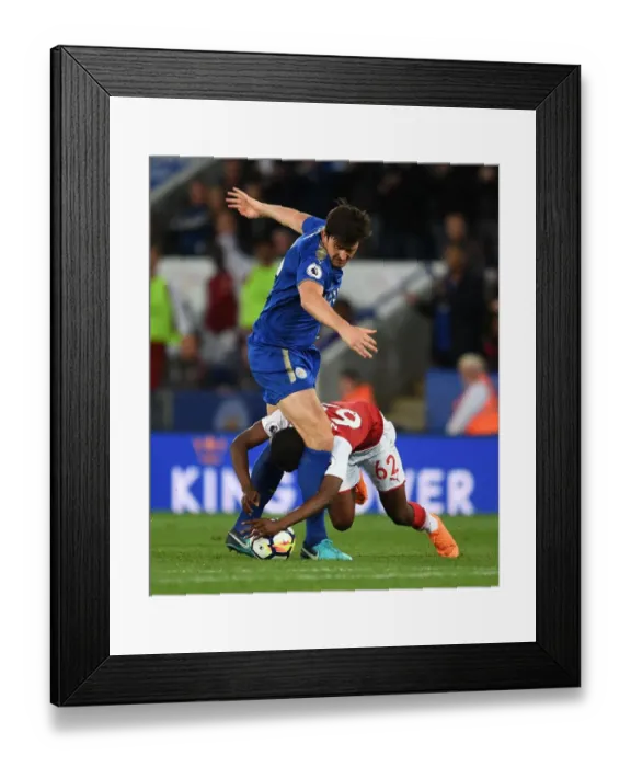 Framed Print : Clash at The King Power: Nketiah vs Maguire in Premier League Showdown Framed Print : Clash at The King Power: Nketiah vs Maguire in Premier League Showdown
