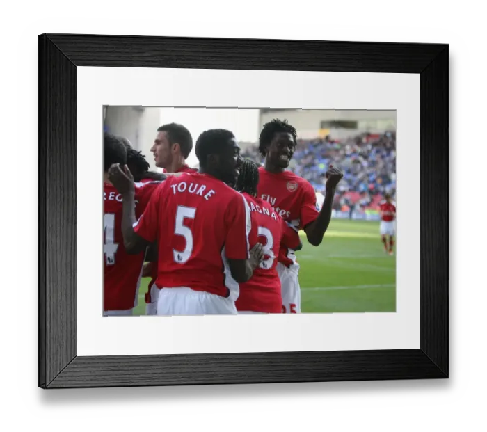 Framed Print : Adebayor's Jubilation: Arsenal's 4-1 Victory Over Wigan Framed Print : Adebayor's Jubilation: Arsenal's 4-1 Victory Over Wigan
