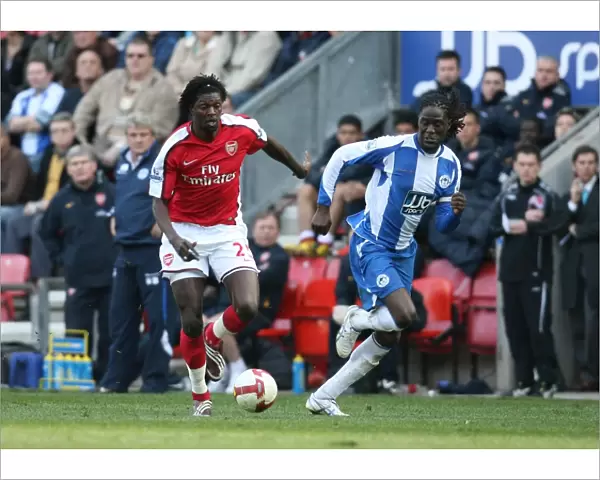 Emmanuel Adebayor (Arsenal) Mario Melchiot (Wigan)